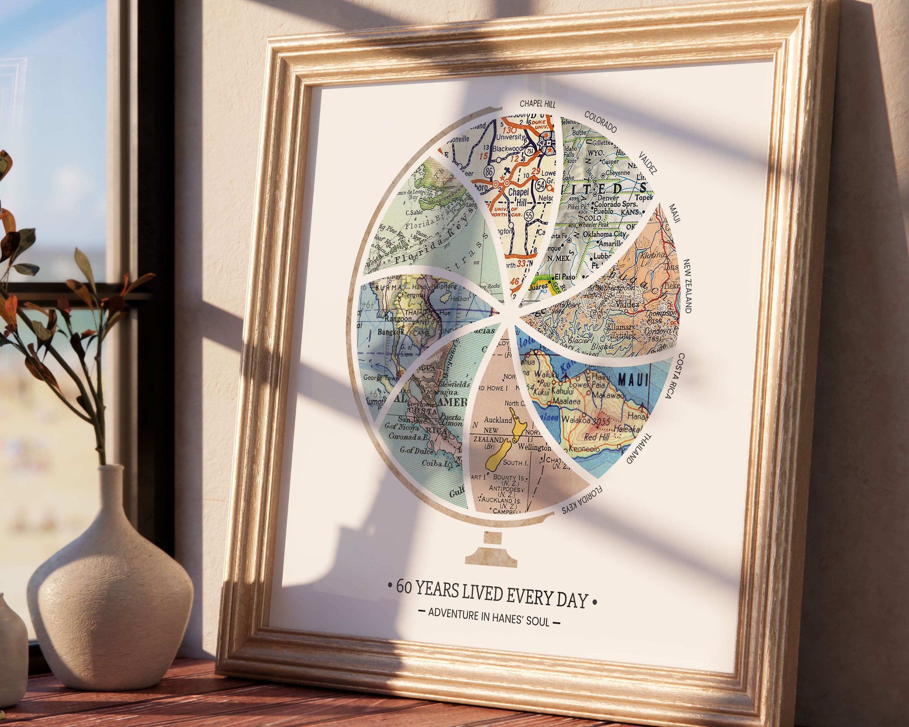Globe and stand relief design with inset maps. Window with light casting on the artwork.