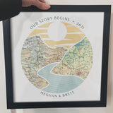 [Black Frame|12x12|2 Maps] River scape relief with inset maps in hills. Woman's arm holding frame.