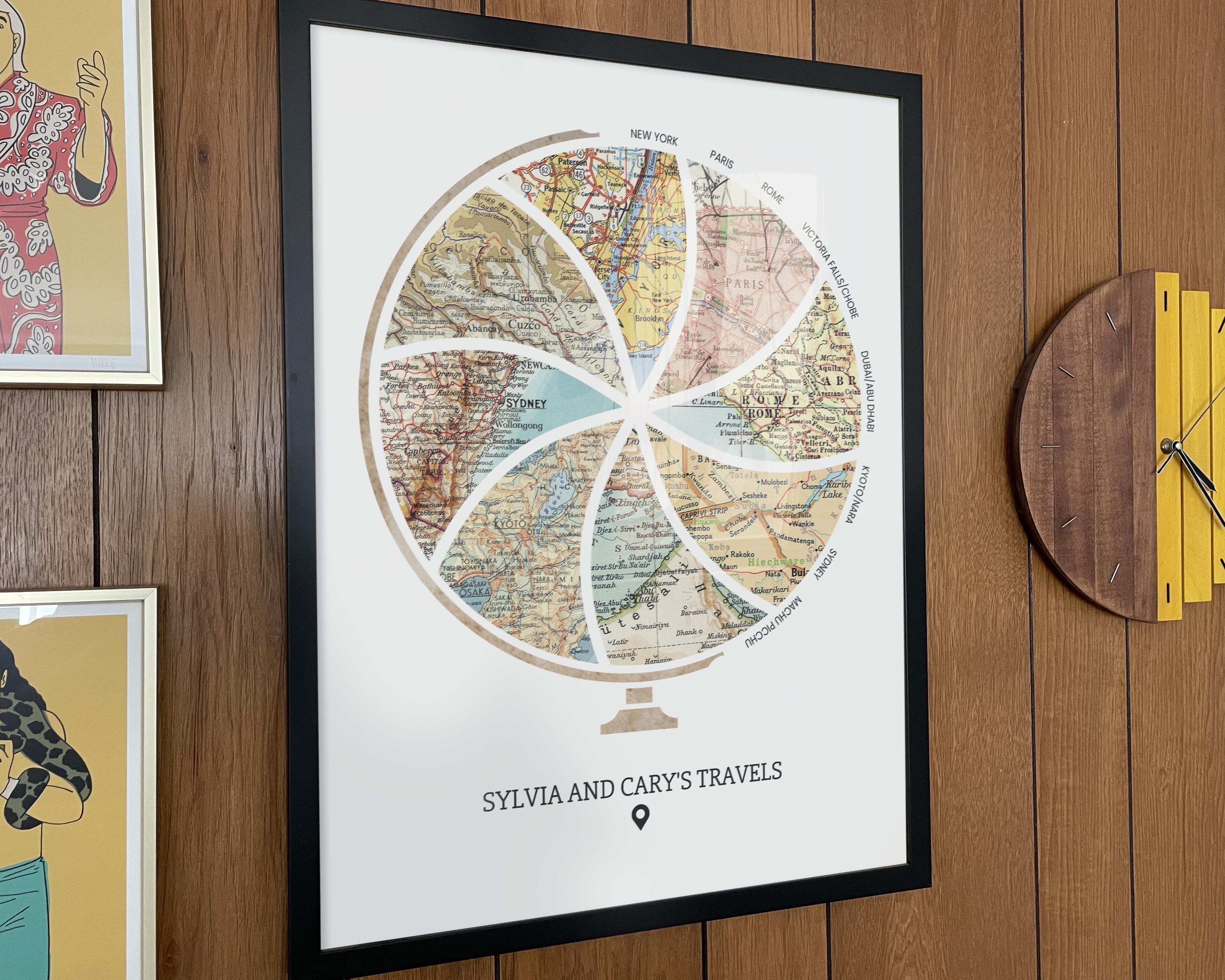 [Black Frame|18x24|8 Maps]. Globe and stand relief design with inset maps. On wood  wall with yellow clock.