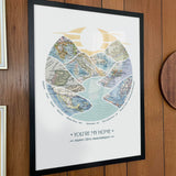 [Black Frame|18x24|8 Maps] River scape relief with inset maps in hills. Wooden wall with yellow clock.