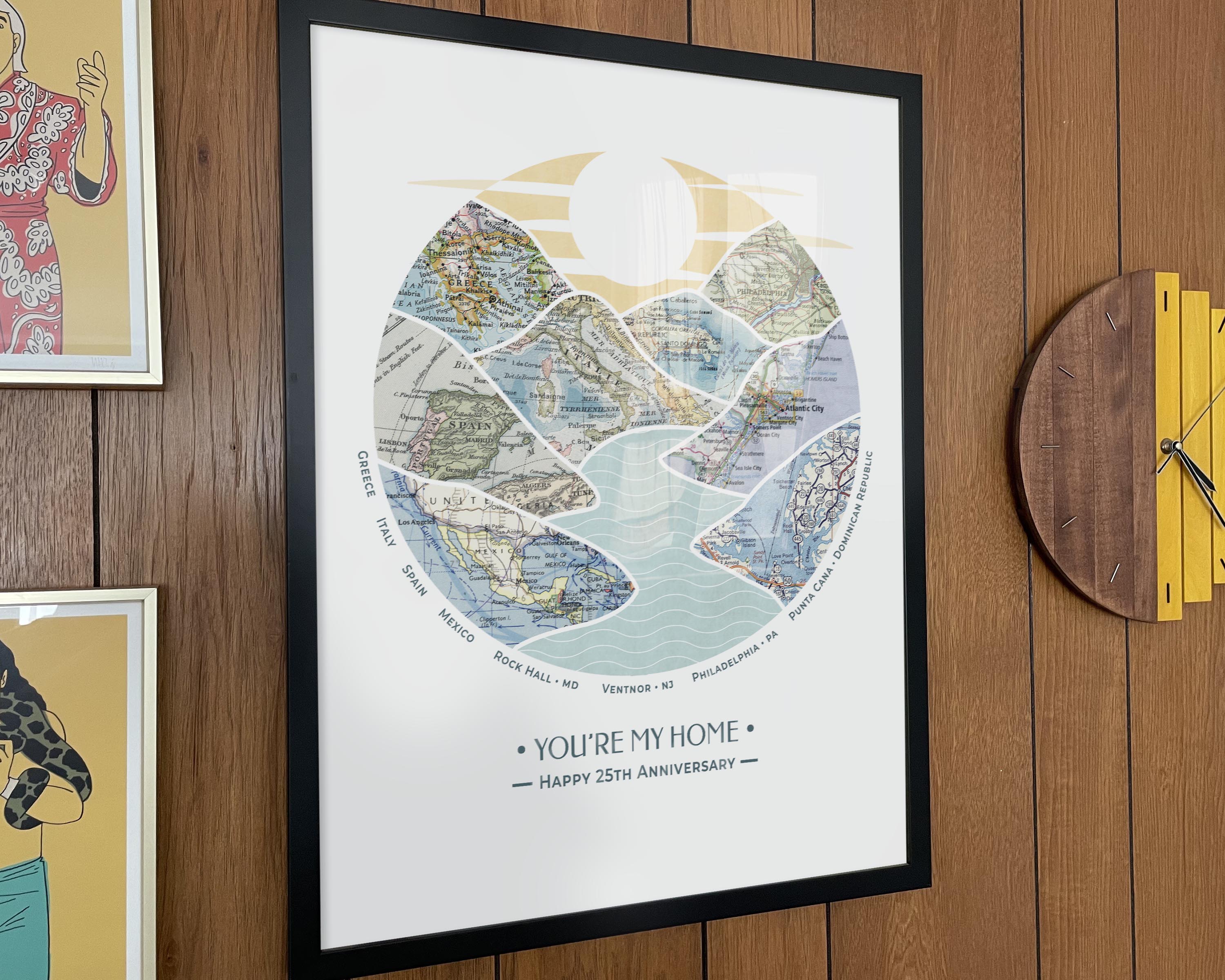 [Black Frame|18x24|8 Maps] River scape relief with inset maps in hills. Wooden wall with yellow clock.