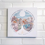 [Canvas Wrap|12x12|6 Maps] Relief of hills and highway into the horizon, with inset maps. On a white brick wall.