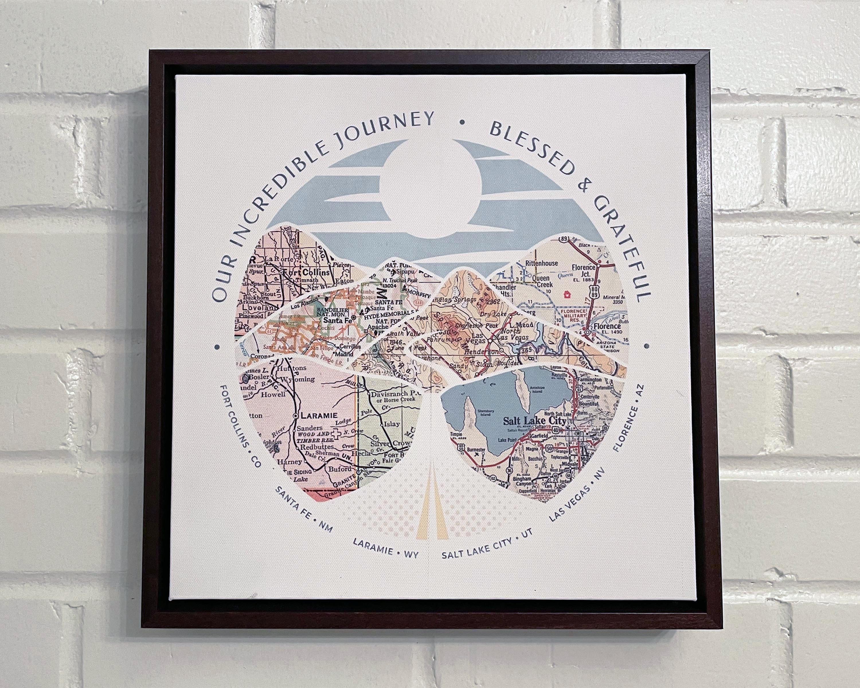 [Walnut Canvas|12x12|6 Maps] Relief of hills and highway into the horizon, with inset maps. On a white brick wall