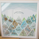 [White Frame|16x16|16 Maps] Mountain scape relief with inset maps and geometric clouds above.