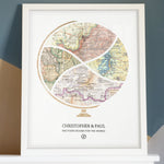 Terra Carta™ Map Print with four maps, resting on a mantle, leaning against a colorfully painted wall, 