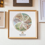 Terra Carta™ Map Print with seven maps, hung on a wall amidst a gallery of wall decor