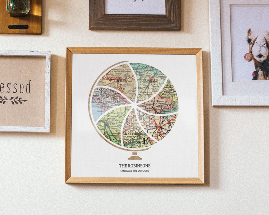 Terra Carta™ Map Print with seven maps, hung on a wall amidst a gallery of wall decor