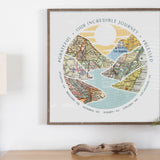 journey river map print six maps wood frame. River scape relief with inset maps in hills. Wood frame over table.